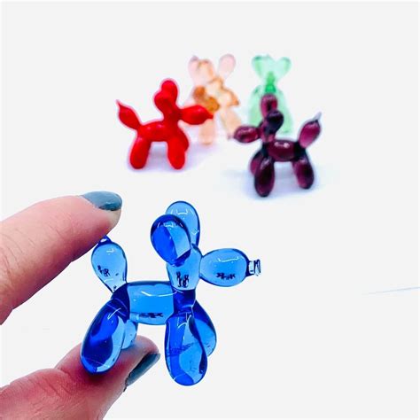 tiny glass balloon dogs   desk