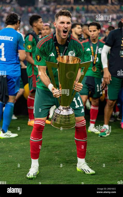 Mexico forward Santiago Giménez 11 celebrates after winning the Gold