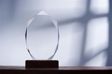 Premium Photo Close Up Of Crystal Trophy Agaist Gray Background