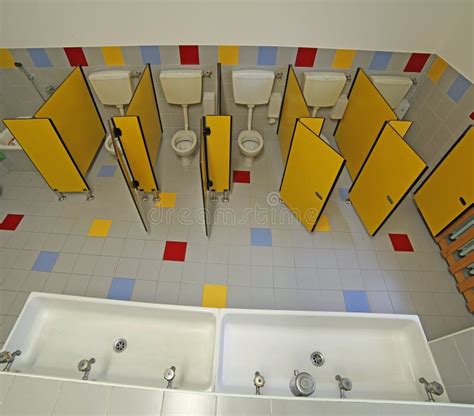 Inside A Bathroom Of A Nursery School With Small Toilets Stock Image