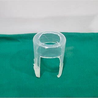 Plastic cap with side windows for insertion of electrolysis needle and ...