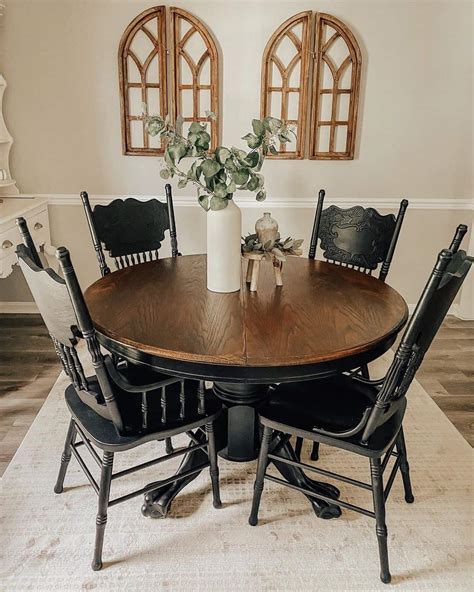 A Black And Wood Table With Black Wooden Dining Chairs Soul Lane