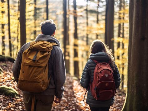 Premium AI Image Adventurous Hikers Exploring The Enchanting Woods