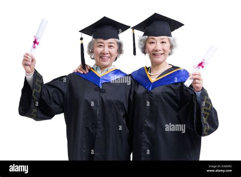 Senior students cheering for graduation Stock Photo - Alamy