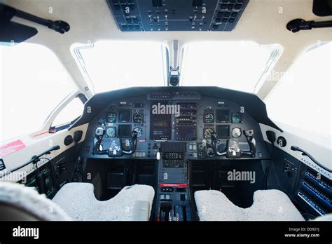 Empty airplane cockpit Stock Photo - Alamy