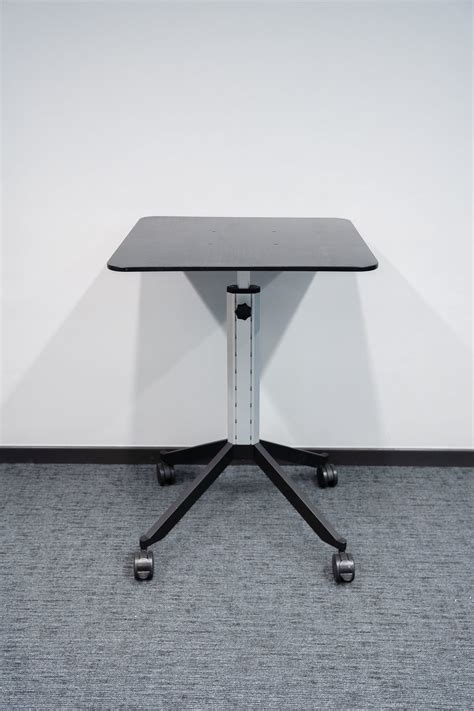 Relieve Furniture Black Mobile Table With Height Adjustable On Wheels