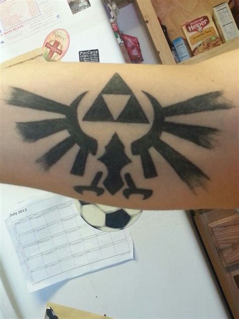 A Hyrulian Royal Family Crest tattoo is in my future, I haven't decided ...