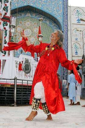 Pakistan Urs Festival A Devotee Performing Dhamal At The Shrine Of