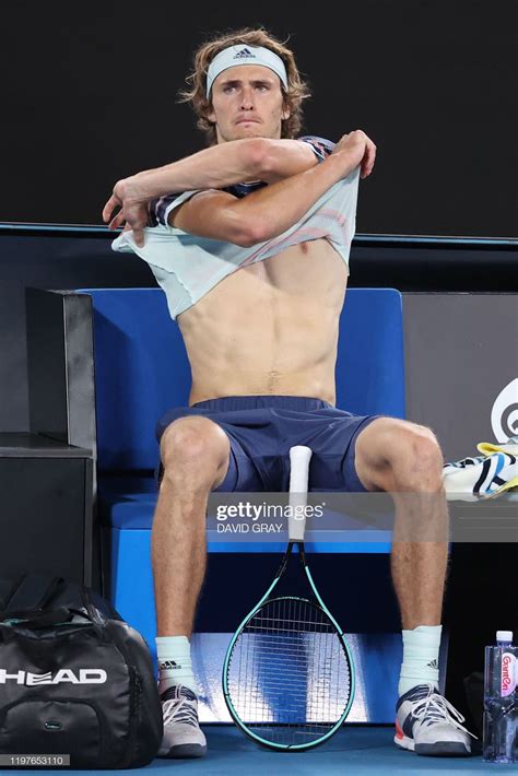 Germany S Alexander Zverev Changes His Shirt During A Break In His