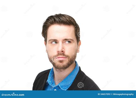 Retrato De Un Hombre Joven Atractivo Con La Barba Que Mira Lejos Foto