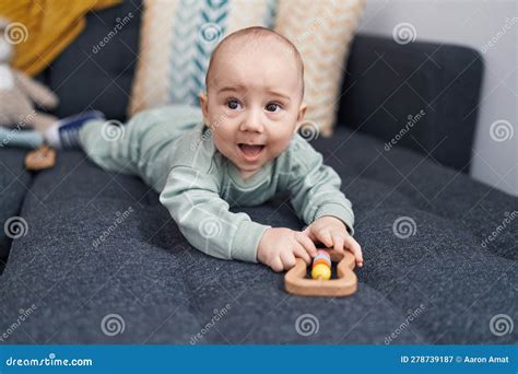 Adorable Caucasian Baby Lying On Sofa At Home Stock Image Image Of