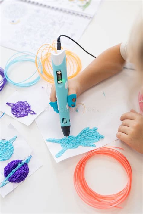 Kid Using a 3D Pen To Create Art and Craft Shapes with Colorful ...