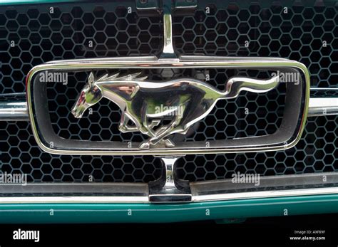 Mustang emblem from a 1964 Mustang automobile Stock Photo - Alamy