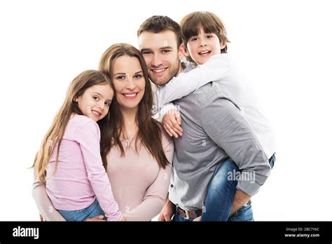 Young family with two kids Stock Photo - Alamy
