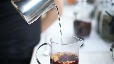 Hot Water Is Poured Into Glass Container For Tea Stock Video At Vecteezy