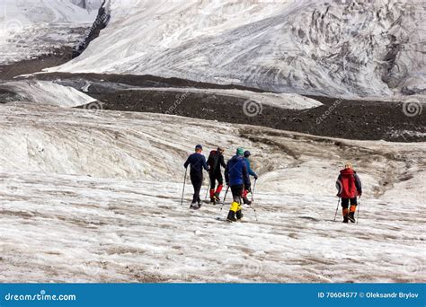 Mountaineers Walking Across Large Glacier Stock Image Image Of