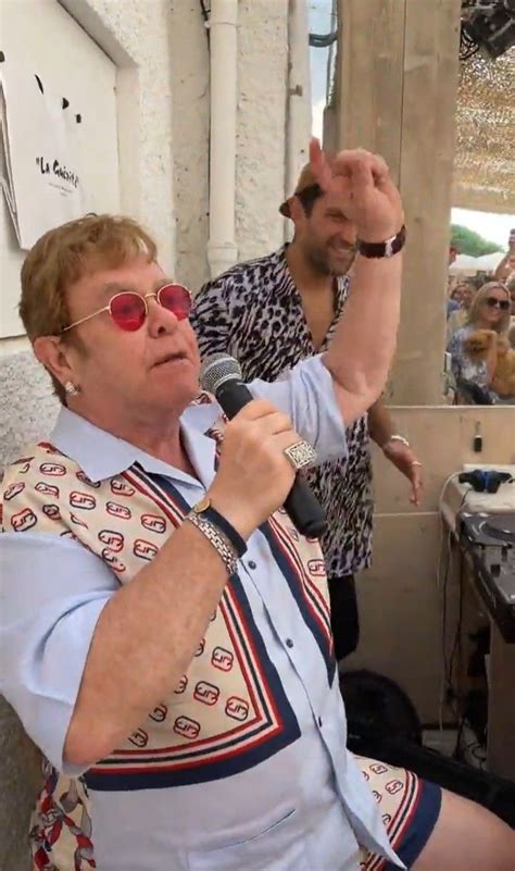 Elton John Performing Live with Captivating Energy