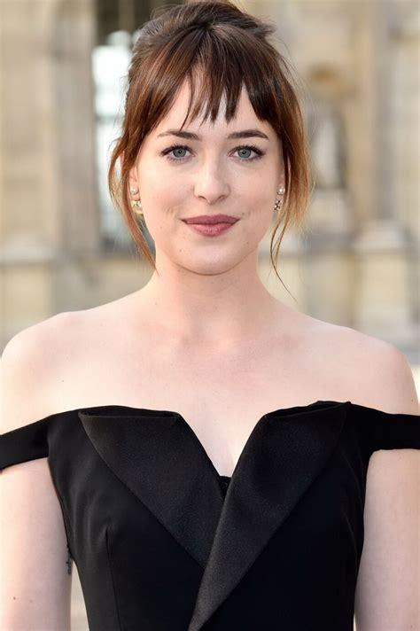 Dakota Johnson Showing Big Cleavage In Black Jumpsuit At Christian Dior Fashion Nudedworld