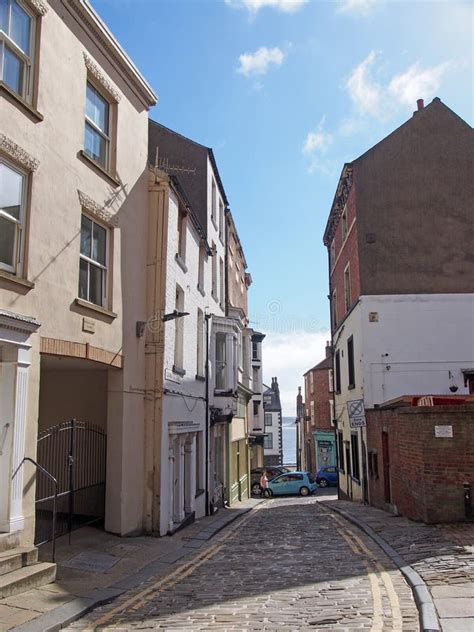 Old Houses Along The Cobbled Road In Leading Post Street In Scarborough