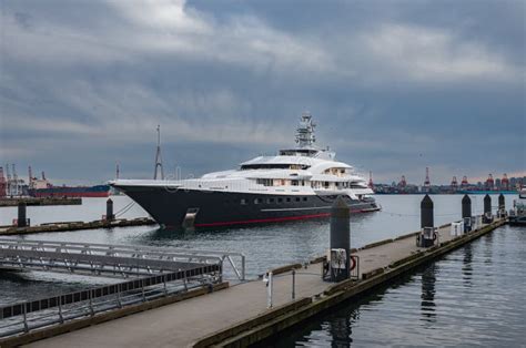 Luxury Yacht Against A Dramatic Blue Sky Big Blue And White Modern