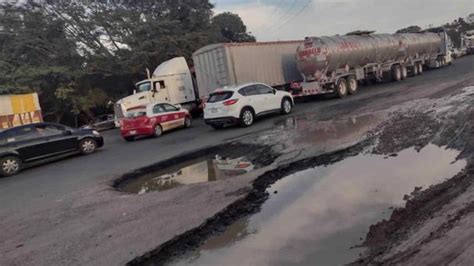 Reportan Enormes Baches En Libramiento Paso Del Toro Santa Fe