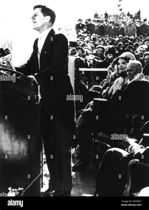 John Kennedy's Inaugural speech (behind him, Jacqueline Kennedy and ...