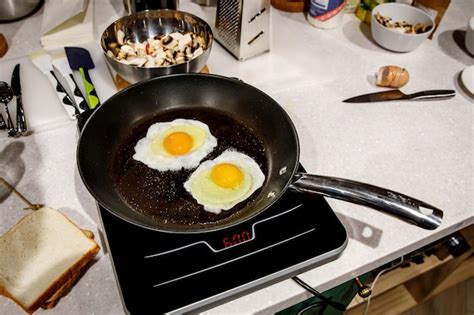 Premium Photo Scrambled Eggs On Frying Pan