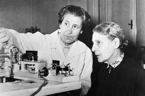 Austrian physicist Lise Meitner (right), photographed c1953. Meitner was the first scientist to ...