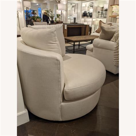 Pottery Barn Balboa Upholstered Swivel Armchair Aptdeco