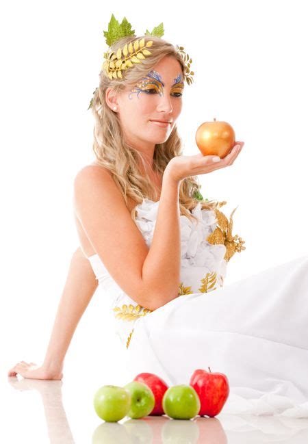 Portrait Of A Beautiful Greek Goddess Holding An Apple Isolated Over