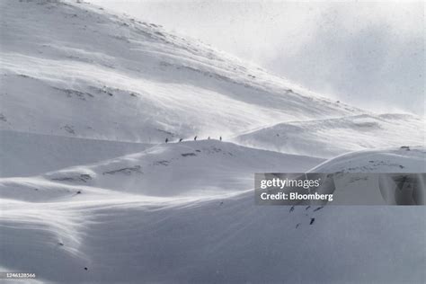 Skiers ski down a piste at the Ischgl ski resort in Ischgl, Austria ...