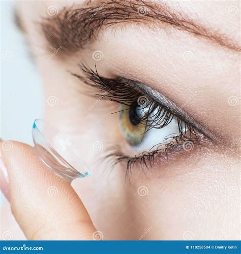 Close Up Shot Of Young Woman Wearing Contact Lens Stock Photo Image