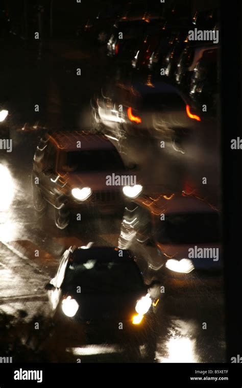 fast car driving in heavy rain at night in town Stock Photo - Alamy