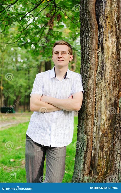 Young Man In Glasses Lean On Tree Stock Photo Image Of Male Handsome