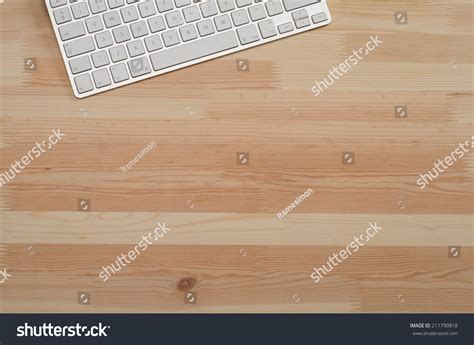 Office Wooden Desktop Top Down View With Computer Keyboard Stock Photo