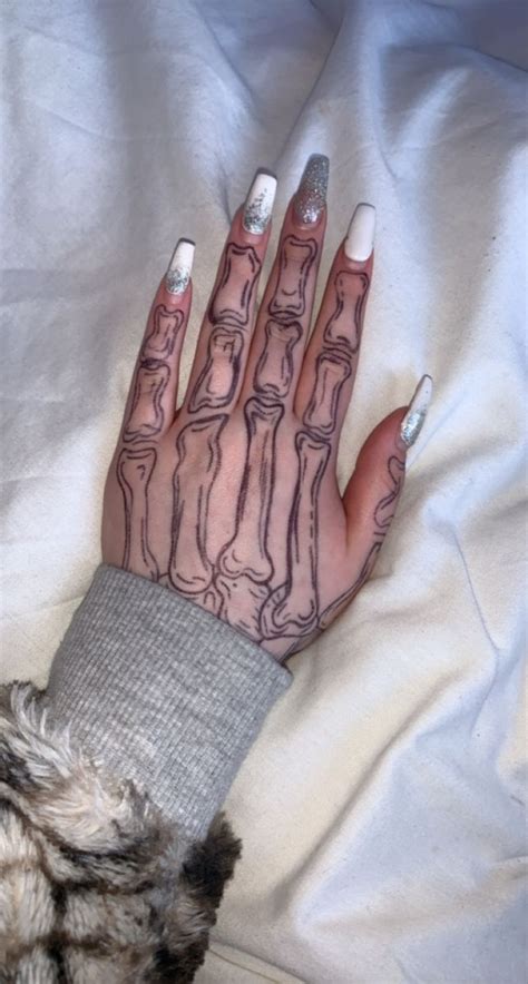 Skeleton drawing hand Tattoo | Skeleton hand tattoo, Simple hand ...