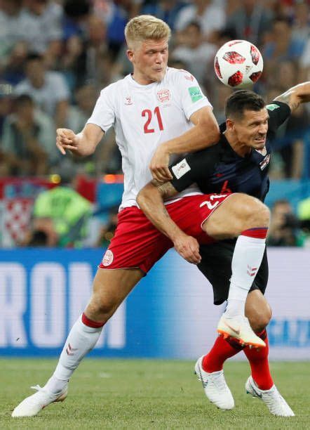 Dejan Lovren Of Croatia National Team And Andreas Cornelius Of Denmark