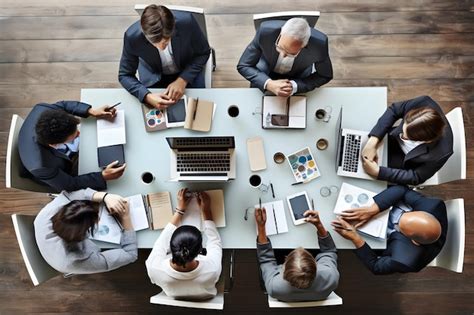 Premium Photo Diverse Group Of Professionals Collaborating On Laptops