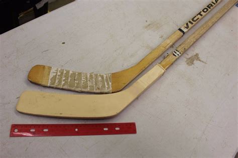 Two Vintage Wooden Hockey Sticks