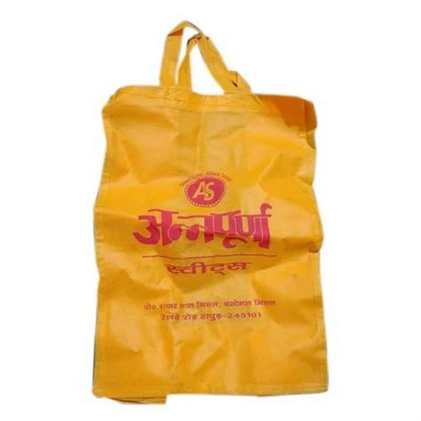 Yellow Loop Handle Non Woven Bag Capacity 10kg Size Dimension