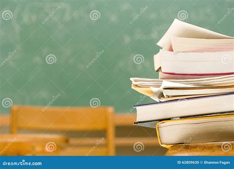 Pile Of Books On A Desk Stock Photo Image Of Learning 62809630