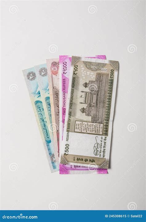 UAE Dirhams Between Indian New Rupees Currency Bank Notes Royalty Free