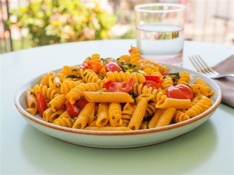 Whole Grain Pasta Dish With Tomatoes And Rocket Stock Photo Image Of