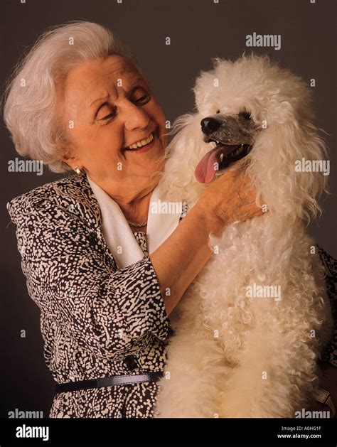 Ladies Holding Dogs Hi Res Stock Photography And Images Alamy