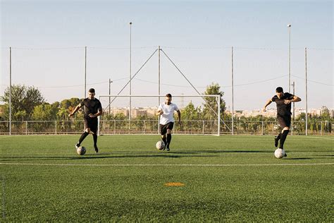 Three Soccer Player Running By Stocksy Contributor Javier D Ez