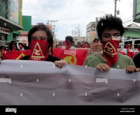 Filipino activists from the communist youth group Kabataang Makabayan ...