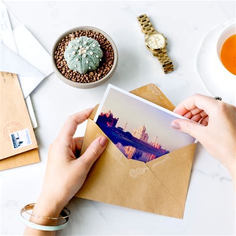 Premium Photo Woman Hands Holding Postcard