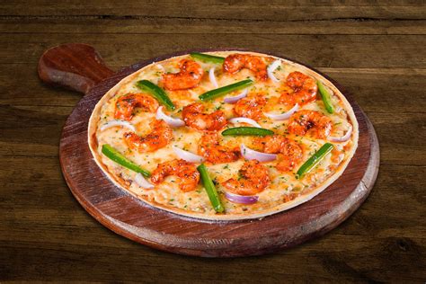 Order Schezwan Prawns Pizza Thin Crust Pizza From Ovenstory On EatSure