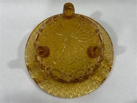 Fenton And L G Wright Amber Daisy And Button Kettle Ashtray Brown