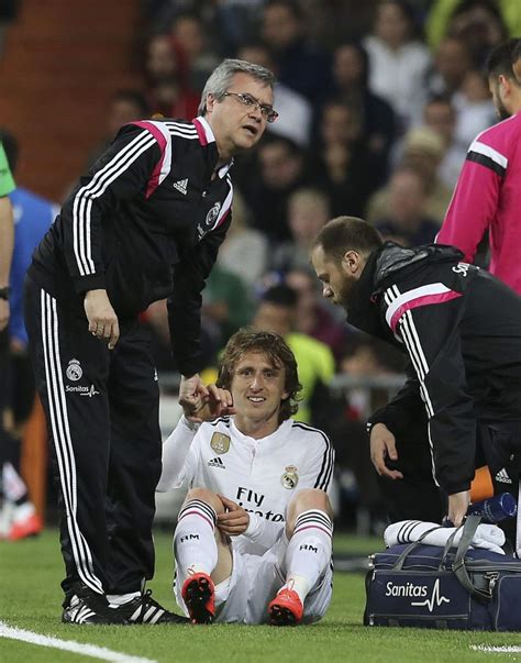 Modric Short Hair : Luka Modric new haircut after winning 2014 ...